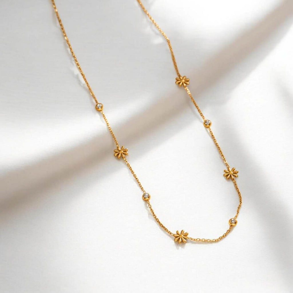 Set de joyas colalr de cuentas flores y circonita y puplsera a juego de acero inoxidable oro 18K PVD waterproof